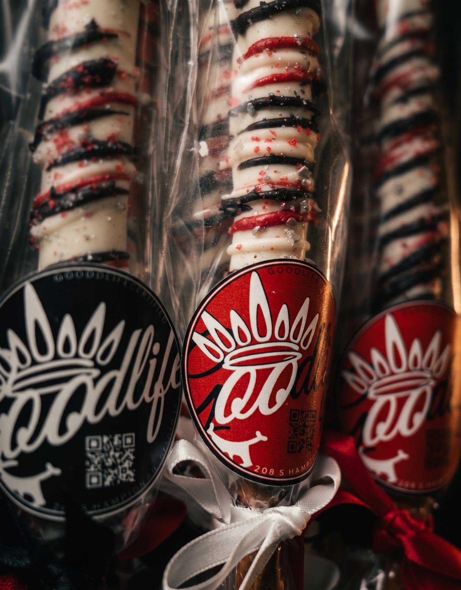 Goodlife decorated pretzel rods in coordinated red, black, and white presentation